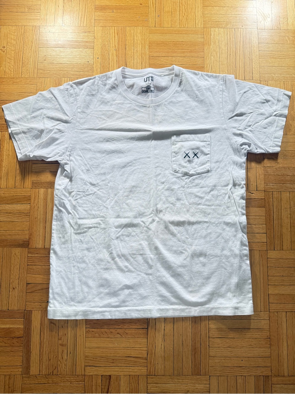 Uniqlo x KAWS White Pocket Tee with KAWS XX Detail large